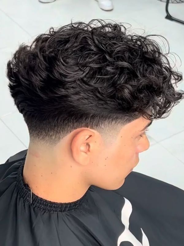 Medium-Length Hairstyles That Shine with a Low Taper